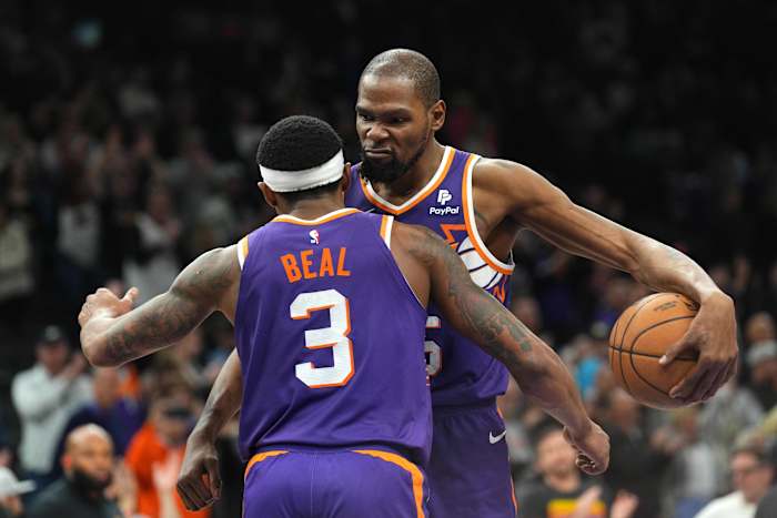 Phoenix Suns guard Bradley Beal (3) and Phoenix Suns forward Kevin Durant (35) hug during the second half of the game against the Indiana Pacers at Footprint Center. Mandatory Credit: Joe Camporeale-USA TODAY Sports